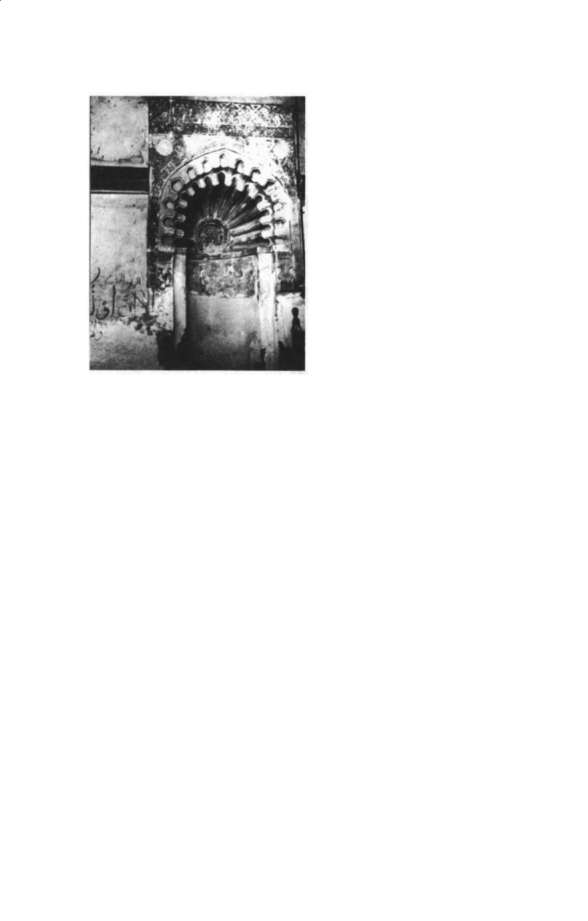 Medieval Fustat beside the Nile, showing markets, mosques, workshops, and its relationship to Cairo