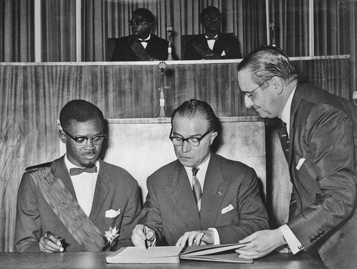 Portrait of Mobutu Sese Seko in an official presidential setting, with Zaire-era symbolism